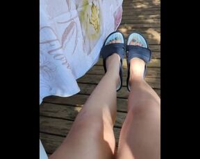 I play with my sandals, view of my blue patent feet