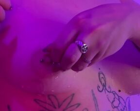 Fetish Ice play, cold on pierced nipples