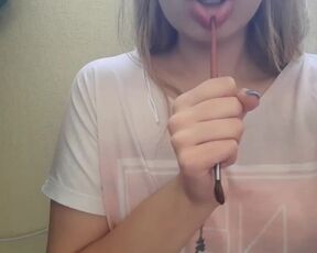 Sexy Whore with Blondy Hair and Big Pink Lips Sucks Painting Brush