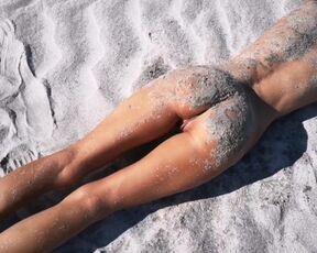 Stranger Finds a Perfect Tanned Skinny Brunette on a Nudist Beach and gives her a Hot Piss