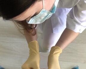 Female doctor examines penis