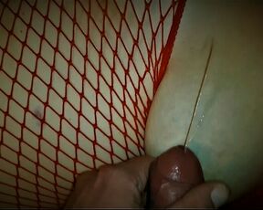 The milf in the red fishnet overalls waxed the sperm on her tits while masturbating together.