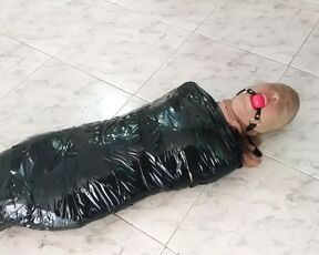 Tape Mummified Girl Pantyhose Hooded And Ball Gagged