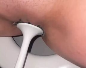 Licking public toilets in the hotel and playing with toilet brush