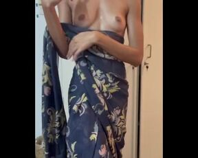 Amateur Indian Desi girl does saree strip tease for her boyfriend during a wedding