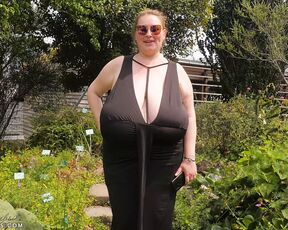 Walking braless in city garden