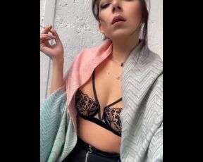 Sexy milf is smoking in lingerie