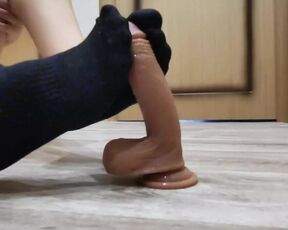 Footjob in black socks