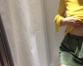 Masturbating in a fitting room