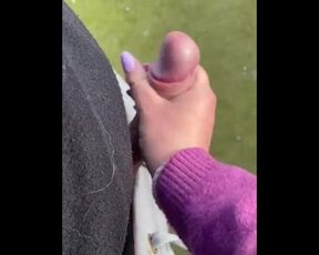 Hand job outside in soccer field