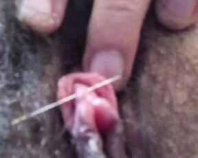 Clitoris needle piercing